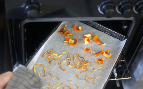 dry-orange-peels-in-baking-tray